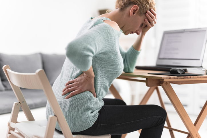 How does stress affect my spine?